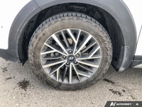 This Hyundai Tucson boasts a Regular Unleaded I-4 2.4 L/144 engine powering this Automatic transmiss... (image 9)