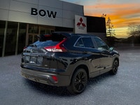 The 2025 Mitsubishi Eclipse Cross NOIR S-AWC in a striking Black hue offers a 4x4 drivetrain that pr... (image 4)