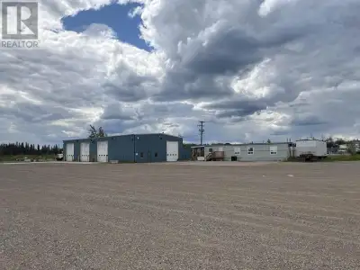 This 4.299 acres of M1 zoned property, includes a 5,000 sq/ft shop equipped with four 14'x16' insula...