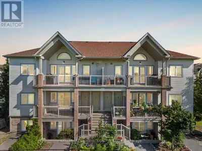 Welcome to this charming 2-bed, 1.5-bath ground-level stacked condo in Stittsville North! This well-...