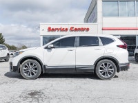 Discover premium comfort and all-weather confidence with the 2021 Honda CR-V Touring AWD. Finished i... (image 2)