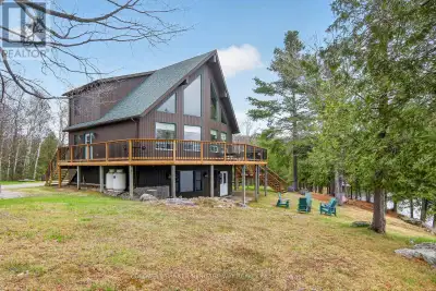 Discover the pinnacle of private waterfront living on the serene shores of Twentysix Lake. This spra...