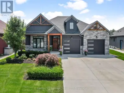 Welcome to 281 Regatta DriveYou wont want to leave after seeing this stunning, one-of-a-kind brick b...