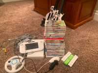 Wii and Wii U with 3 controllers, 2 guitars