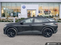 This Volkswagen ID.4 delivers a Electric engine powering this Automatic transmission. Window Grid An... (image 1)