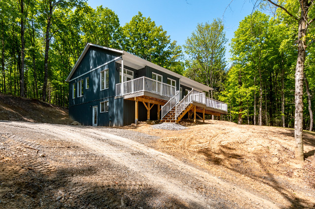 Stunning year-round home resting on a private 3.25-acre property in Houses for Sale in Muskoka