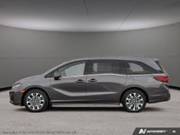 The 2026 Honda Odyssey Touring van in elegant Gray, complemented by a reliable automatic transmissio... (image 2)