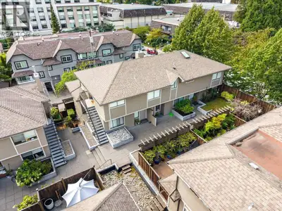 Spacious Central Lonsdale Townhouse style 2 bedroom + den & 2.5 Baths. The Large open Living Room/Di...