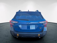 The 2022 Subaru Outback Wilderness in a striking blue finish with an all-wheel-drive system is your... (image 3)