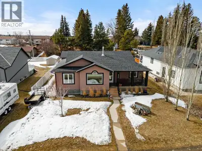 Modern bungalow with custom finishes throughout, offering a well maintained and move-in ready space...