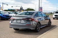 Keyless Start,Automatic Highbeams,Leather Steering Wheel,Trip Computer,Keyless Entry,Heated Steering... (image 1)