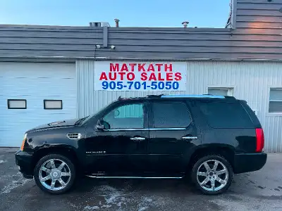 2008 Cadillac Escalade. 7 passenger, Black exterior with black leather interior, equipped with 6.2 l...