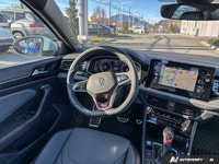 This Volkswagen Jetta GLI in the incredible blue like monument grey delivers a Intercooled Turbo Pre... (image 9)