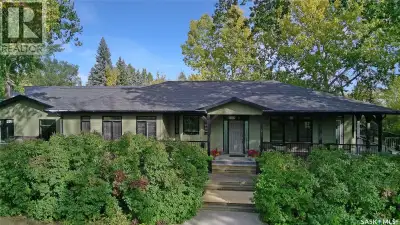 Set on four city lots at the edge of Swift Current, this exceptional custom-built bungalow delivers...