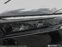 Experience the 2026 Honda CR-V Hybrid TrailSport in stunning Black, equipped with All-Wheel Drive fo... (image 9)