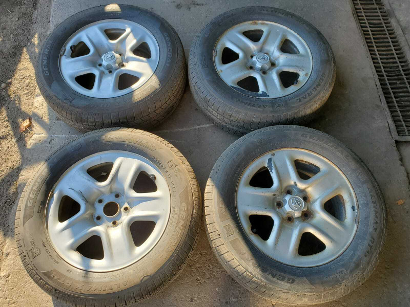 225 65 17 RIMS AND TIRES ALL SEASON TOYOTA RAV4 AND OTHERS