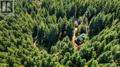 This 10.82-acre property is surrounded by nature and offers complete privacy just 15 mins south of D...
