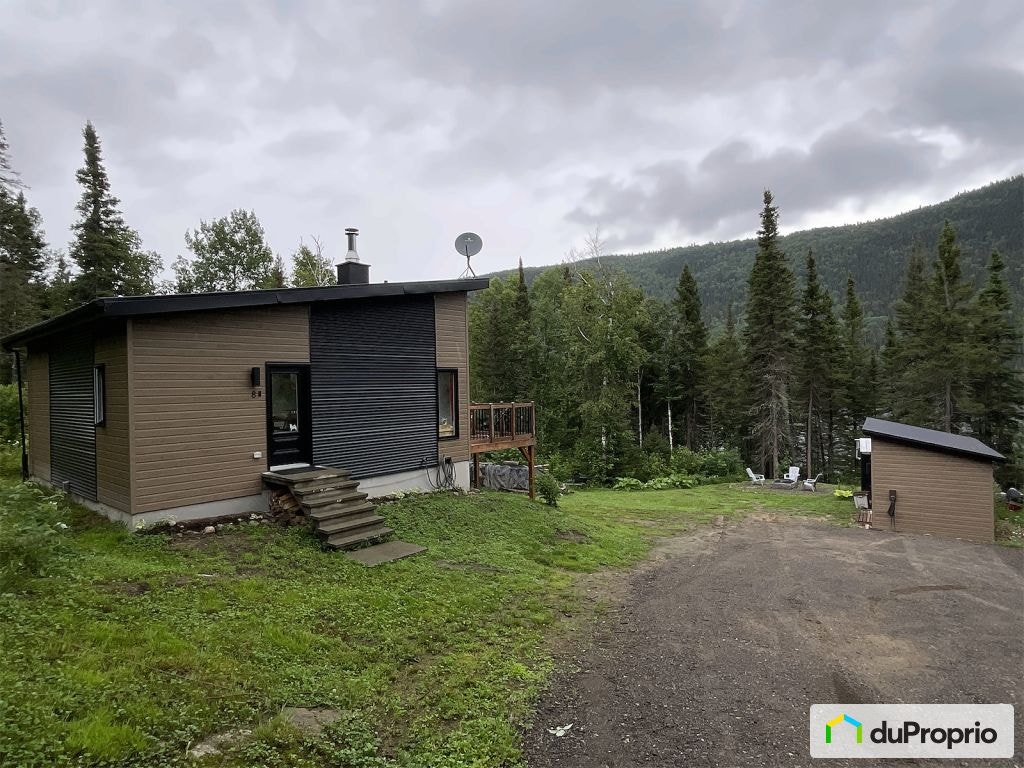 $489,000 - Bungalow for sale in Ferland-Et-Boilleau — photo 1