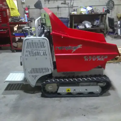 Honda 13hp electric start engine, rocking rollers, ride on platform, hydraulic dump, hydrostatic dri...