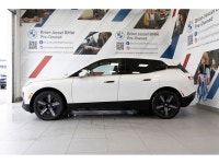 2024 BMW iX xDrive50 Electric Motor AWD Single-Speed Automatic EXTERIOR - ALPINE WHITE INTERIOR - OY... (image 4)