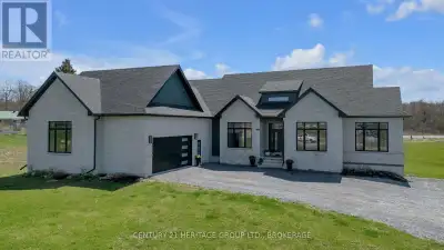 Welcome to 245 Mann Drive, an extraordinary 5-bedroom, 3.5-bathroom custom home set on an estate-siz...