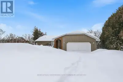 Located on the north shore of Hay Bay, this bright waterfront home offers three bedrooms and four ba...