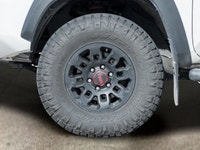 The 2019 Toyota Tacoma TRD Off Road 4x4 Double Cab V6 in a stunning white color with a robust 4x4 dr... (image 3)