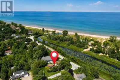 Welcome to 9997 Edward Street in Port Franks where you will find a raised bungalow with attached gar...