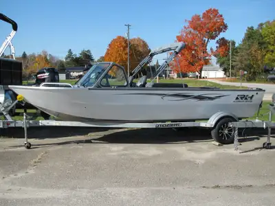 IN OUR SHOWROOM FOR HEATED VIEWING-TOWN AND COUNTRY RV IS THE APPOINTED RH ALUMINUM BOAT DEALER FOR...