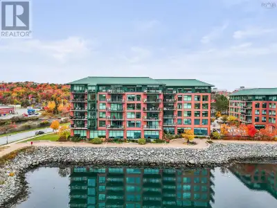 Welcome to Suite 409 at the prestigious Dockside Condos on Waterfront Drive in Bedford a beautifully...