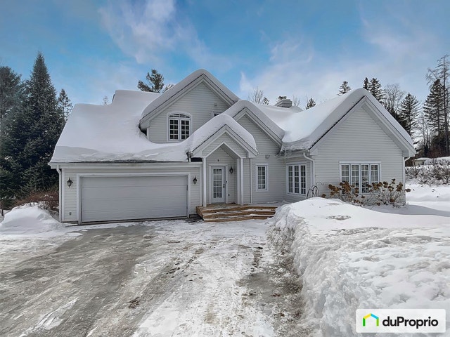 $920,000 - Bungalow for sale in Morin-Heights — photo 1