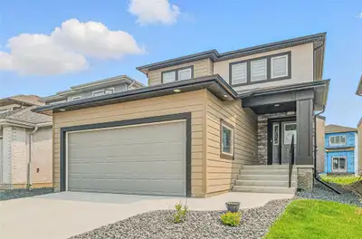 2K//Winnipeg/S/S Thurs June 12. The fabulous stone, stucco and Hardie board exterior welcomes you to...