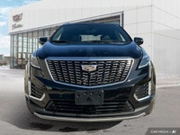The 2021 Cadillac XT5 Premium Luxury includes a panoramic roof, ventilated front seats, heated rear... (image 7)