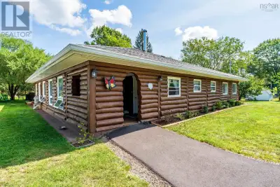This wonderful log home and oversized .85 Acre lot has been completely restored and renovated allowi...