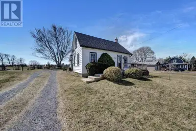 Discover 18617 Loyalist Parkway in the hamlet of Hillier! Perfectly situated near some of the favour...