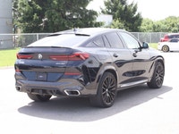 Experience distinctive styling, premium luxury, and impressive performance with this 2021 BMW X6 xDr... (image 3)
