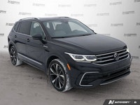 This Volkswagen Tiguan boasts a Intercooled Turbo Regular Unleaded I-4 2.0 L/121 engine powering thi... (image 7)