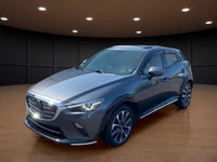 Get ready to conquer the roads with the 2022 Mazda CX-3 GT, a sophisticated gray SUV that combines a... (image 1)