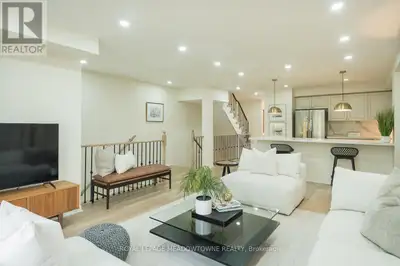 Welcome to this beautifully updated 3-bedroom plus den townhome located in the highly desirable Chur...