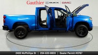 The 2024 Chevrolet Silverado 1500 Custom Trail Boss is a rugged off-road--focused pickup that comes... (image 7)