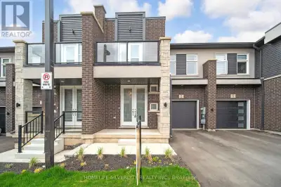 Welcome to 5672 Dorchester Rd Unit 4 a stylish, nearly new 3-bedroom, 3-bath townhouse in the heart...