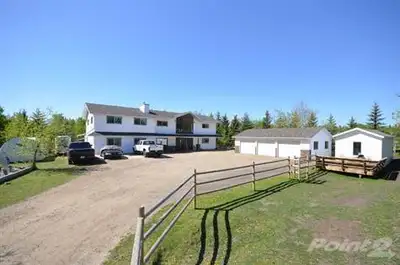 Take a meandering drive down a paved road to this tranquil and practical property, just 5 mins west...