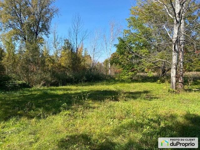 $299,999 - Residential Lot for sale in Dunham — photo 1