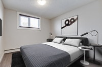 Amenities: Quiet Building • Heat & Water Included • Open Living Rooms Suite & Building: Spacious bac... (image 1)