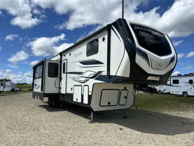Keystone Montana High Country fifth wheel 351BH highlights: Triple Slides Coffee Station Power Theat...