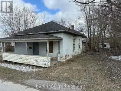Opportunity Awaits in the Heart of Beautiful Orangeville! Huge 66.51 x 292.47 Foot Lot approximately...