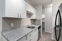 Amenities: Security Lights • Air Conditioning • Dishwashers Suite & Building: One-, and two-bedroom... (image 4)