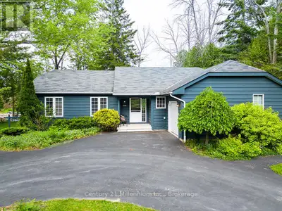 Welcome to 111 Patricia Drive, your cozy home away from home in The Blue Mountains. This warm and in...