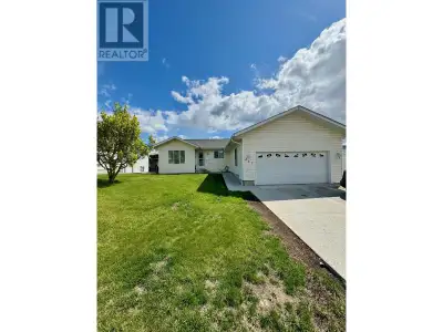 Welcome Home! This three bedroom, two bathroom home is designed for family living with a ground-leve...