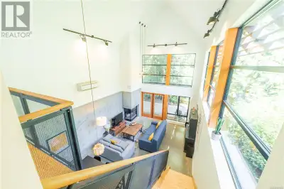 Gorgeous custom-built home with caretaker’s cottage on a half-acre lot close to the beach. This stun...
